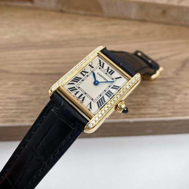 Cartier
montre femme en or jaune 18 carats et diamants Tank Française