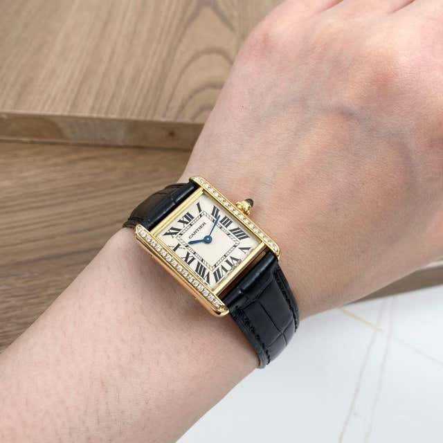 Cartier
montre femme en or jaune 18 carats et diamants Tank Française
