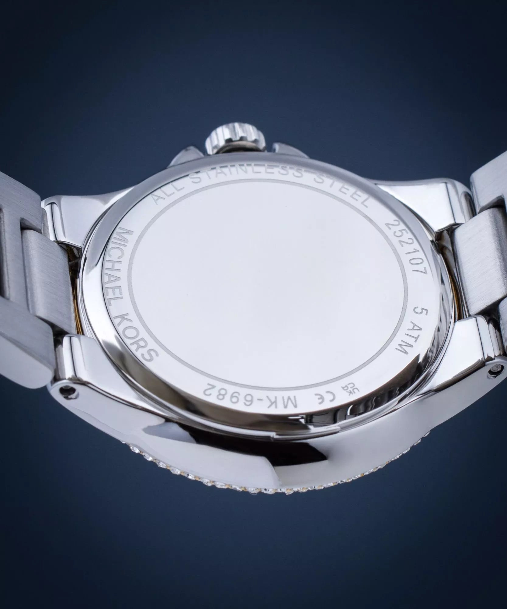 Michael Kors
Petite montre Camille bicolore avec pierres pavées