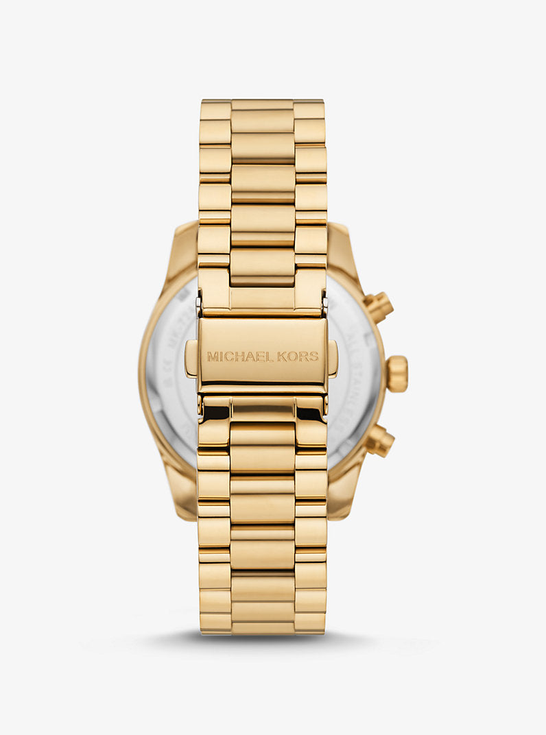 MK Montre Lexington dorée avec pavé de pierres