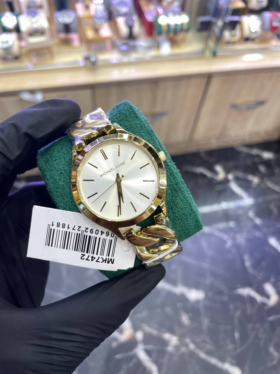 Michael Kors
Montre Slim Runway à maillons gourmette dorés