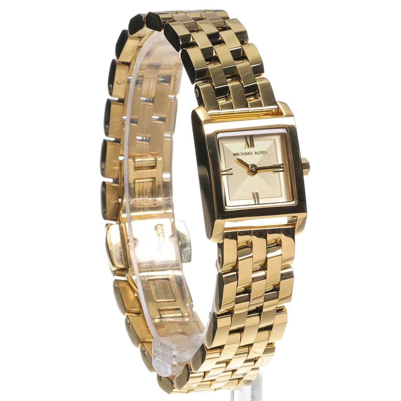 Michael Kors
Micro montre Georgie de ton or