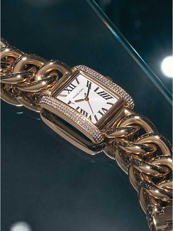 Montre surdimensionnée dorée à maillons gourmette et à pavé MK Emery