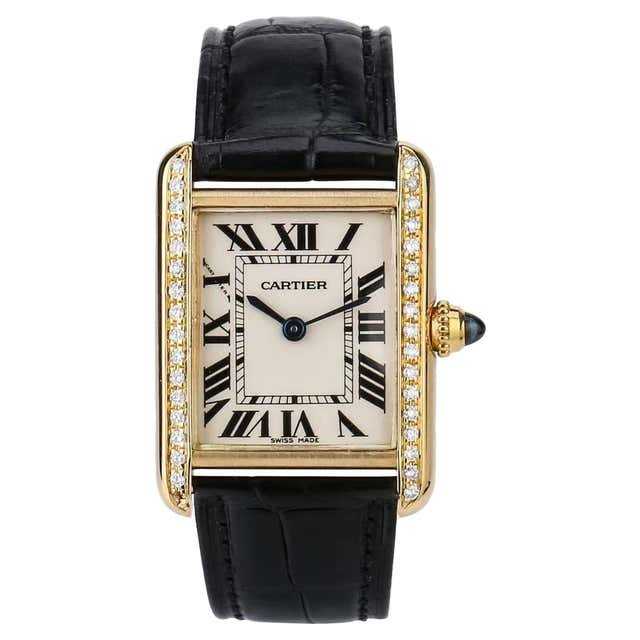 Cartier
montre femme en or jaune 18 carats et diamants Tank Française
