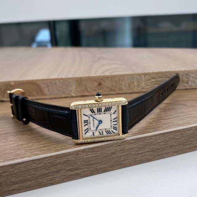 Cartier
montre femme en or jaune 18 carats et diamants Tank Française