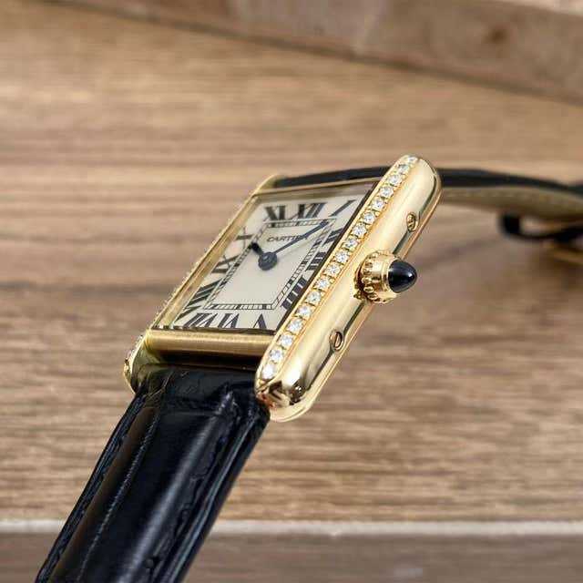 Cartier
montre femme en or jaune 18 carats et diamants Tank Française