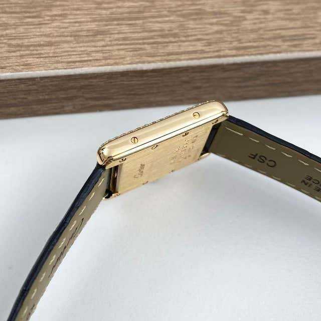 Cartier
montre femme en or jaune 18 carats et diamants Tank Française