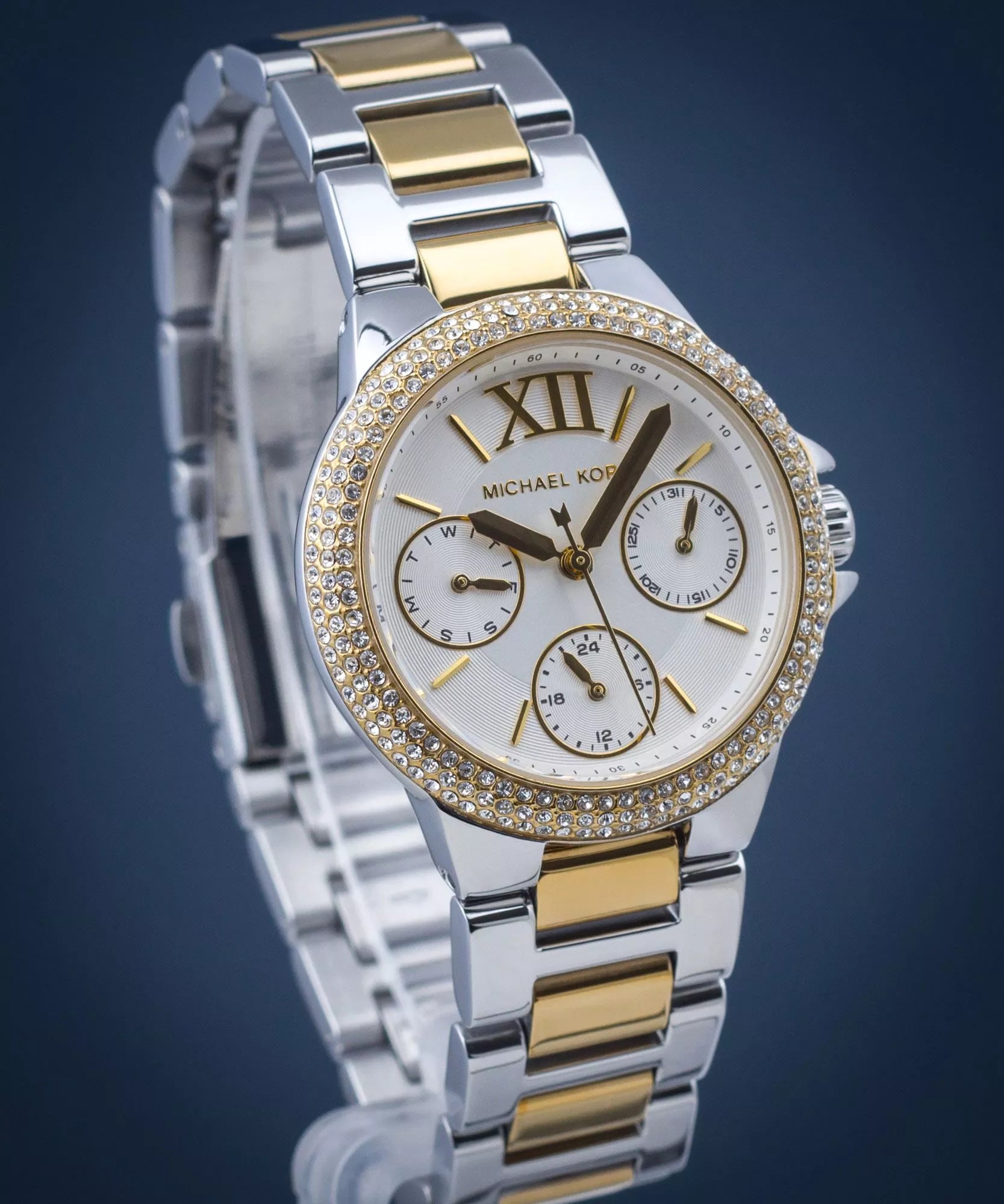 Michael Kors
Petite montre Camille bicolore avec pierres pavées