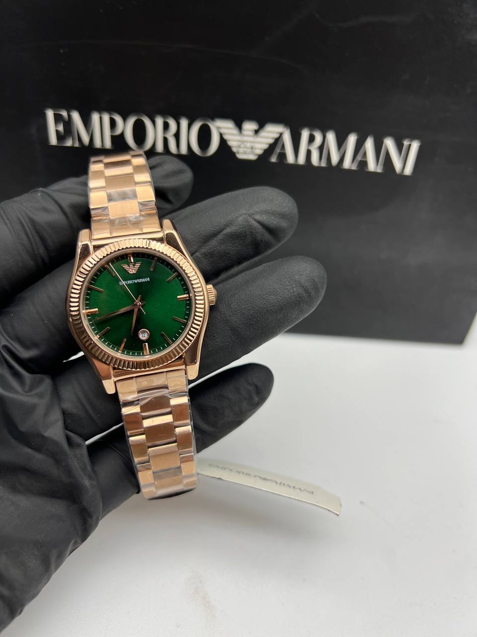 Montre Emporio Armani trois aiguilles avec date, en acier inoxydable doré rose