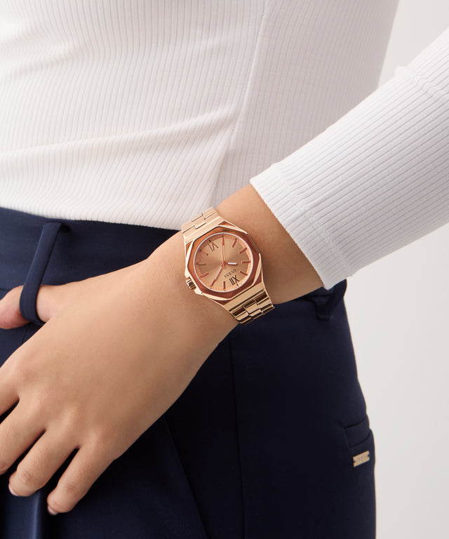 Montre analogique GUESS pour femme en acier doré rose