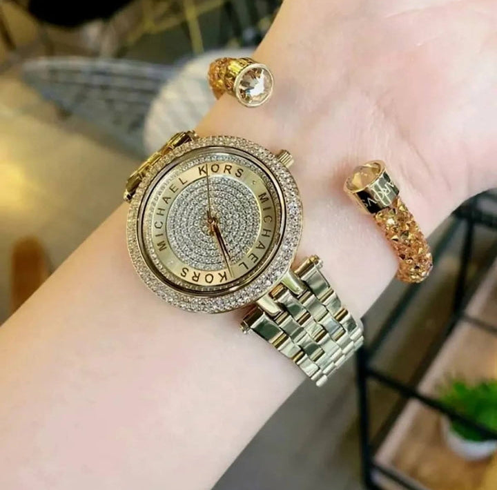 Montre Darci miniature dorée à pavé MK